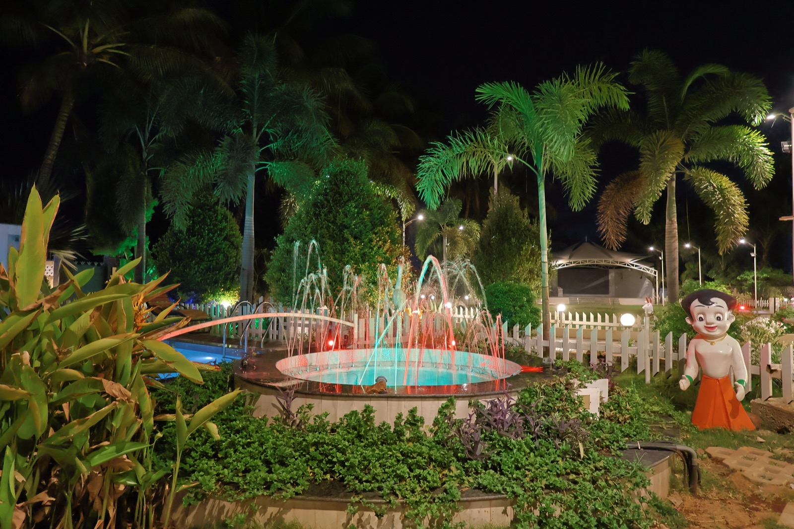 Pool with Villa Backdrop at Night